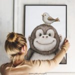 Smiling Baby Monkey with Bird on Top – Cute Animal Wall Art